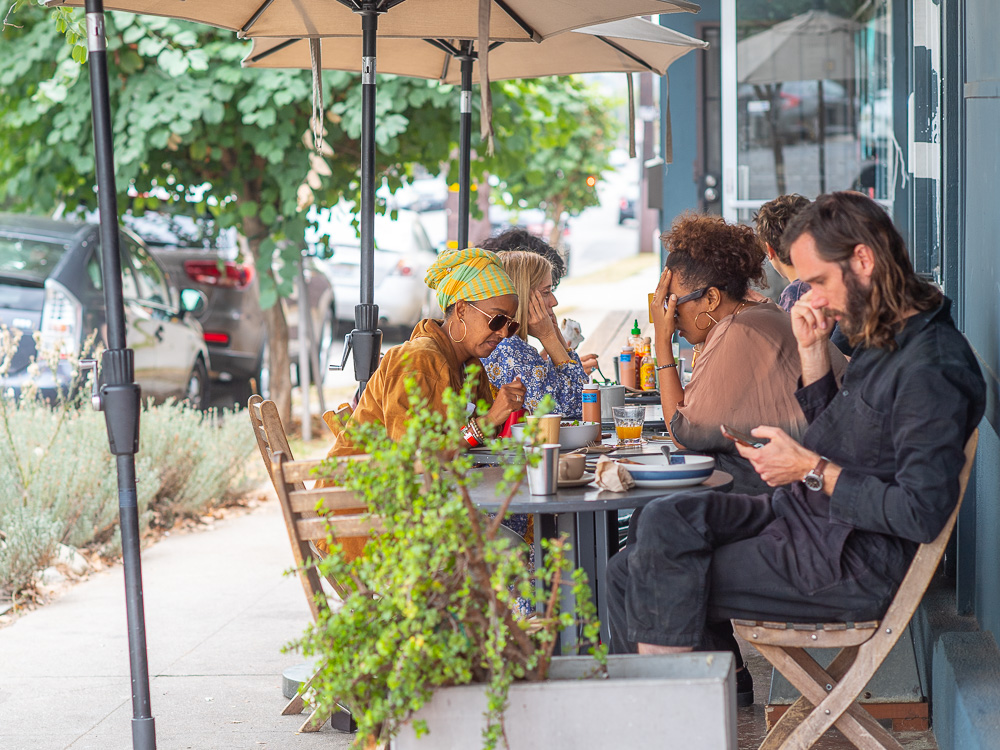 People at an outdoor cafe, Garvanza, Los Angeles, CA