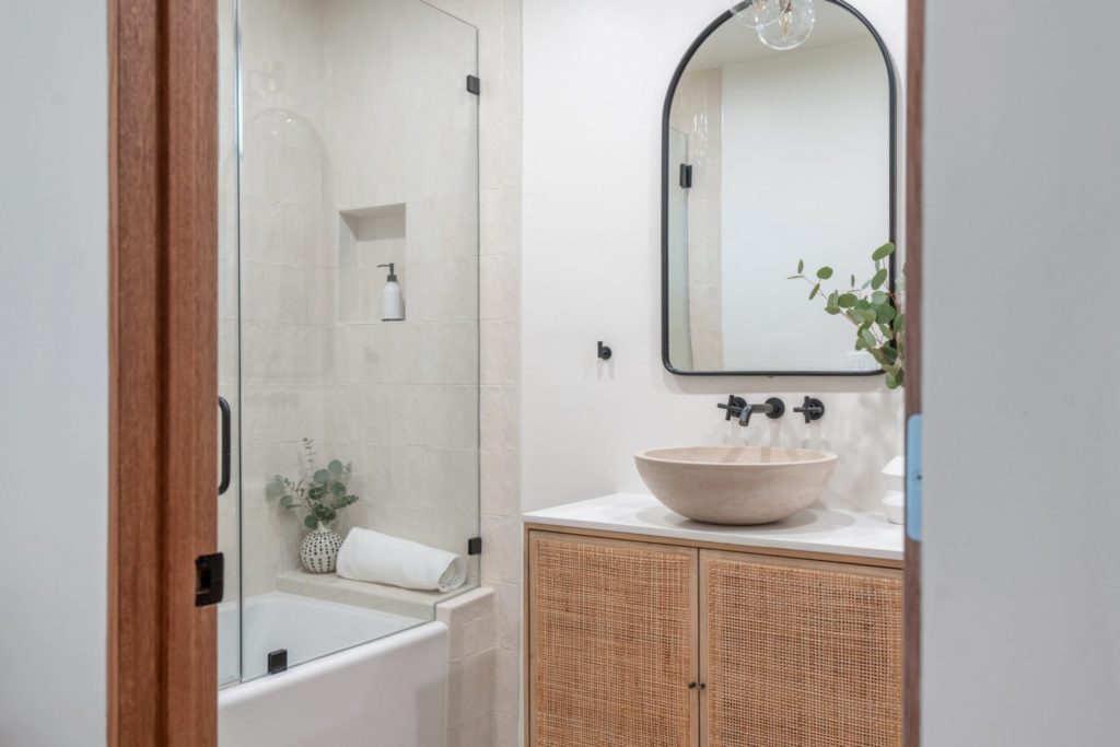 bathroom mirror and tub
